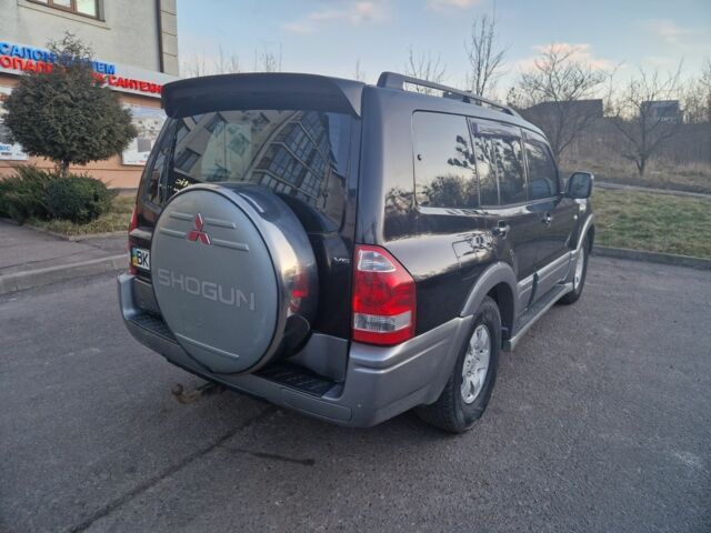 Чорний Міцубісі Паджеро, об'ємом двигуна 3 л та пробігом 310 тис. км за 6800 $, фото 8 на Automoto.ua