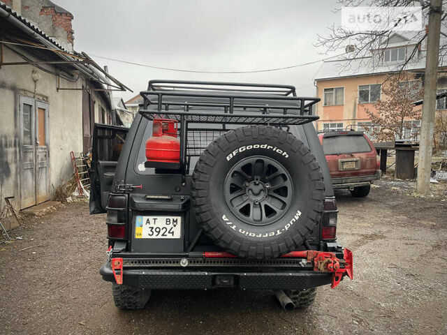 Чорний Міцубісі Паджеро, об'ємом двигуна 2.5 л та пробігом 100 тис. км за 9900 $, фото 22 на Automoto.ua