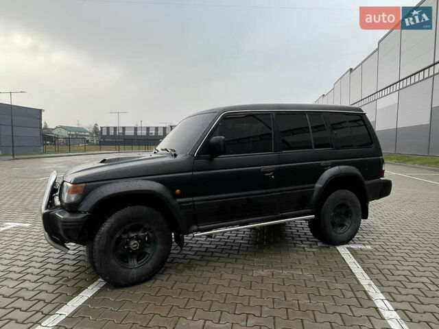 Черный Мицубиси Паджеро, объемом двигателя 2.84 л и пробегом 413 тыс. км за 7700 $, фото 1 на Automoto.ua