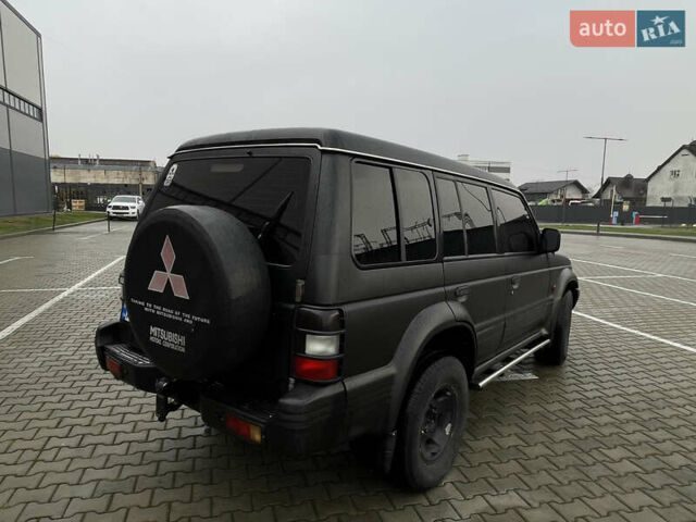 Черный Мицубиси Паджеро, объемом двигателя 2.84 л и пробегом 413 тыс. км за 7700 $, фото 4 на Automoto.ua