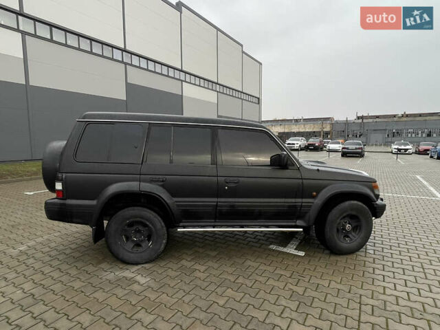 Черный Мицубиси Паджеро, объемом двигателя 2.84 л и пробегом 413 тыс. км за 7700 $, фото 5 на Automoto.ua