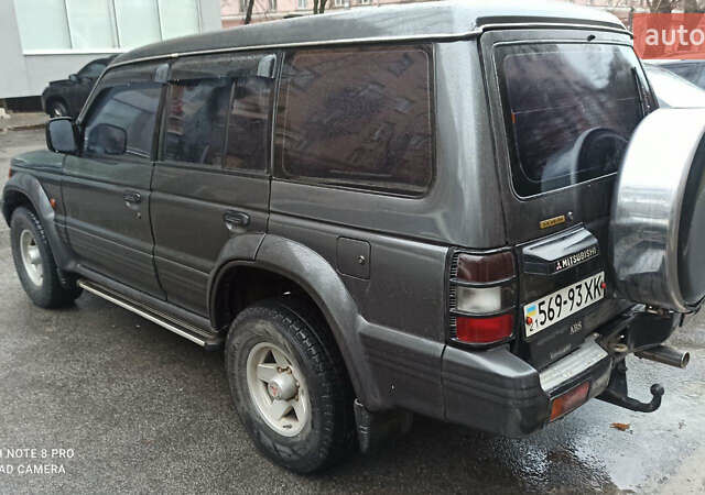 Чорний Міцубісі Паджеро, об'ємом двигуна 3.5 л та пробігом 265 тис. км за 3900 $, фото 1 на Automoto.ua