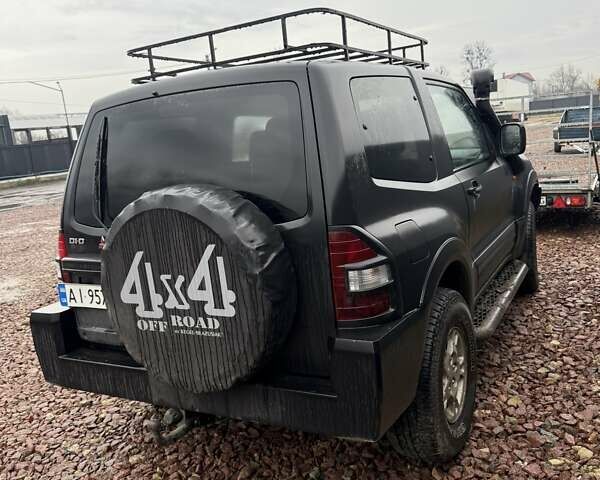Чорний Міцубісі Паджеро, об'ємом двигуна 3.2 л та пробігом 100 тис. км за 11200 $, фото 3 на Automoto.ua