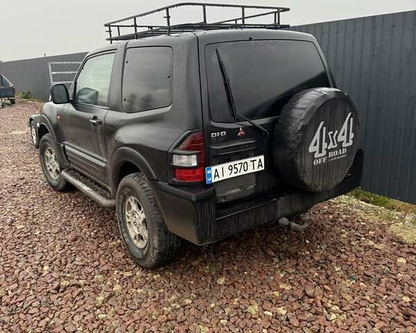 Чорний Міцубісі Паджеро, об'ємом двигуна 3.2 л та пробігом 100 тис. км за 11200 $, фото 4 на Automoto.ua