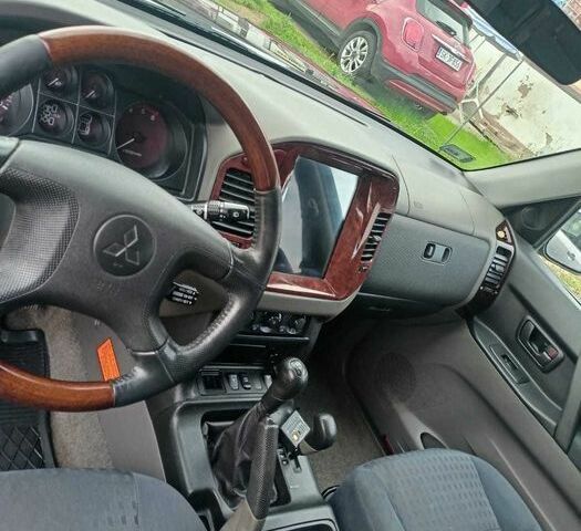 Чорний Міцубісі Паджеро, об'ємом двигуна 3.2 л та пробігом 300 тис. км за 1797 $, фото 4 на Automoto.ua