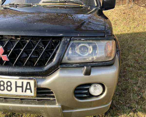 Черный Мицубиси Паджеро, объемом двигателя 2.97 л и пробегом 340 тыс. км за 4400 $, фото 1 на Automoto.ua