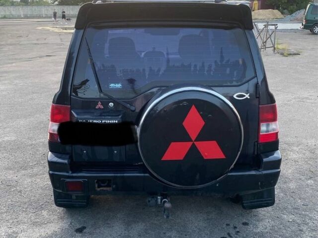 Чорний Міцубісі Паджеро, об'ємом двигуна 1 л та пробігом 2 тис. км за 2050 $, фото 2 на Automoto.ua