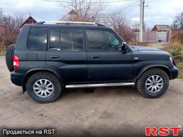 Чорний Міцубісі Паджеро, об'ємом двигуна 1.8 л та пробігом 230 тис. км за 5999 $, фото 1 на Automoto.ua