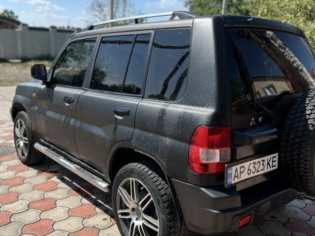 Черный Мицубиси Паджеро, объемом двигателя 1.8 л и пробегом 235 тыс. км за 5350 $, фото 3 на Automoto.ua