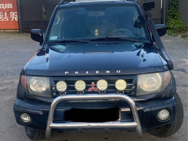 Чорний Міцубісі Паджеро, об'ємом двигуна 1.8 л та пробігом 250 тис. км за 2050 $, фото 1 на Automoto.ua