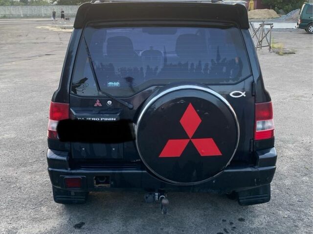 Чорний Міцубісі Паджеро, об'ємом двигуна 1.8 л та пробігом 250 тис. км за 2050 $, фото 3 на Automoto.ua