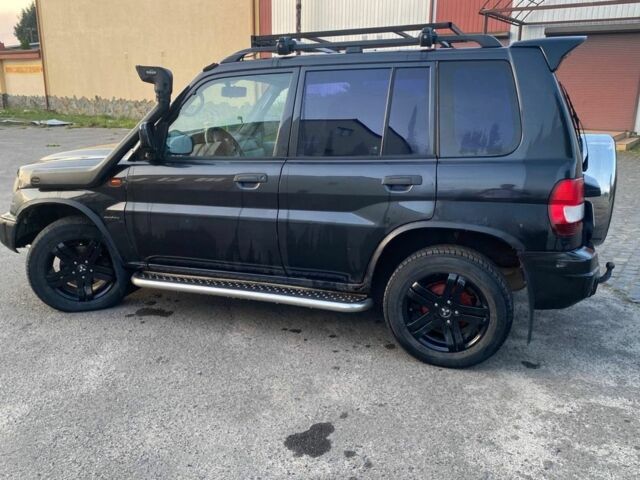 Чорний Міцубісі Паджеро, об'ємом двигуна 1 л та пробігом 2 тис. км за 2050 $, фото 3 на Automoto.ua