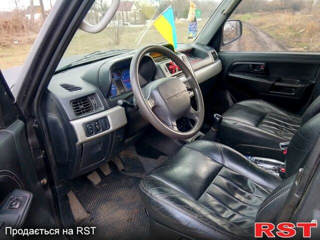 Чорний Міцубісі Паджеро, об'ємом двигуна 1.8 л та пробігом 230 тис. км за 5999 $, фото 7 на Automoto.ua