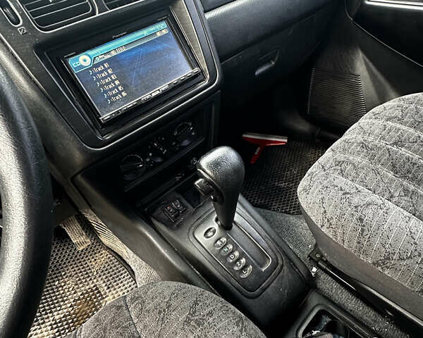 Чорний Міцубісі Паджеро, об'ємом двигуна 1.83 л та пробігом 229 тис. км за 4950 $, фото 12 на Automoto.ua