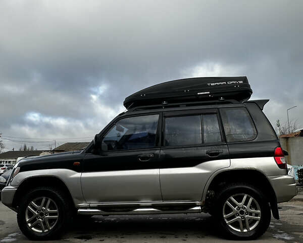 Чорний Міцубісі Паджеро, об'ємом двигуна 1.83 л та пробігом 229 тис. км за 4950 $, фото 6 на Automoto.ua