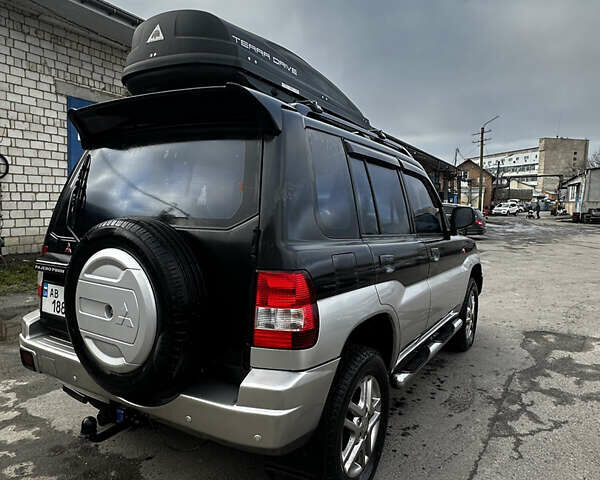 Чорний Міцубісі Паджеро, об'ємом двигуна 1.83 л та пробігом 229 тис. км за 4950 $, фото 3 на Automoto.ua
