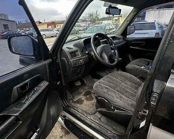 Чорний Міцубісі Паджеро, об'ємом двигуна 1.83 л та пробігом 229 тис. км за 4950 $, фото 7 на Automoto.ua