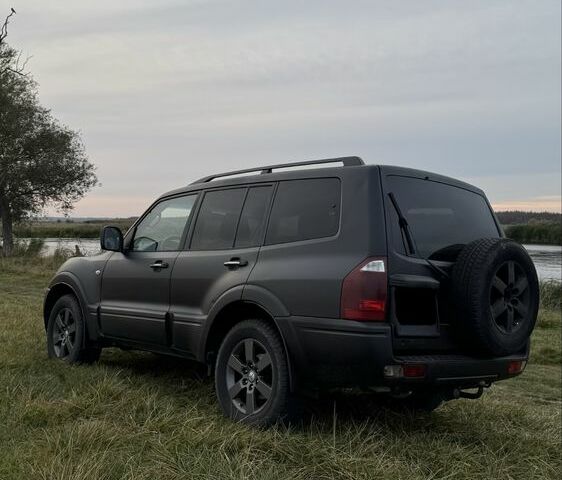 Міцубісі Паджеро 2004 у Харкові на Automoto.ua Чорний Міцубісі Паджеро, об'ємом двигуна 3.2 л та пробігом 506 тис. км за 6900 $, фото 2 на Automoto.ua