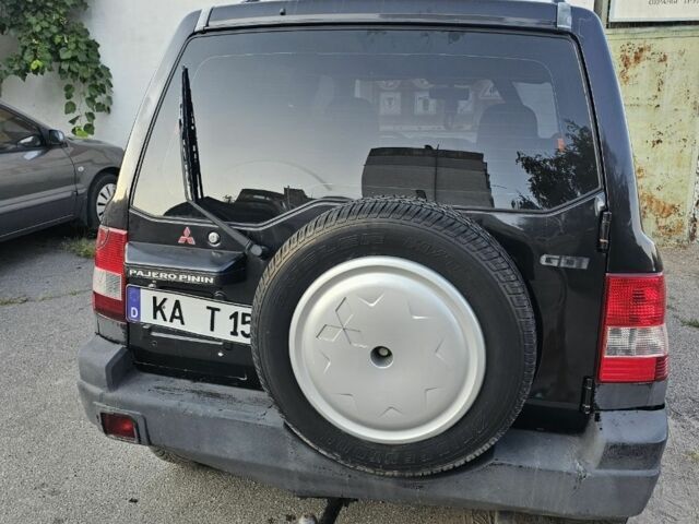 Чорний Міцубісі Паджеро, об'ємом двигуна 2 л та пробігом 200 тис. км за 2400 $, фото 4 на Automoto.ua