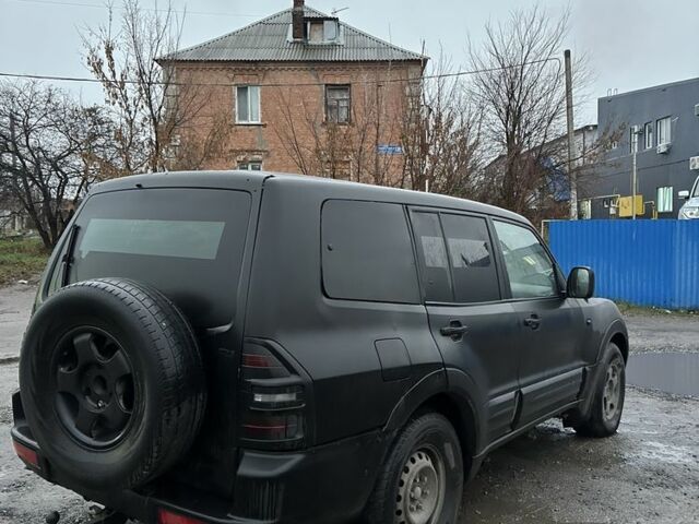 Чорний Міцубісі Паджеро, об'ємом двигуна 3.2 л та пробігом 220 тис. км за 3500 $, фото 4 на Automoto.ua