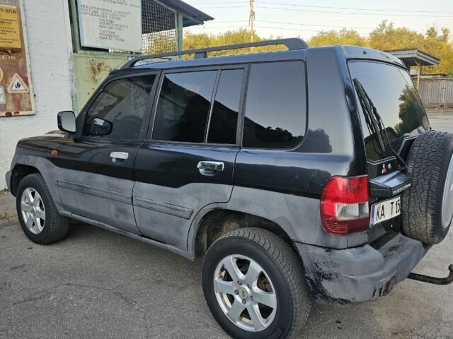Чорний Міцубісі Паджеро, об'ємом двигуна 2 л та пробігом 200 тис. км за 2400 $, фото 1 на Automoto.ua