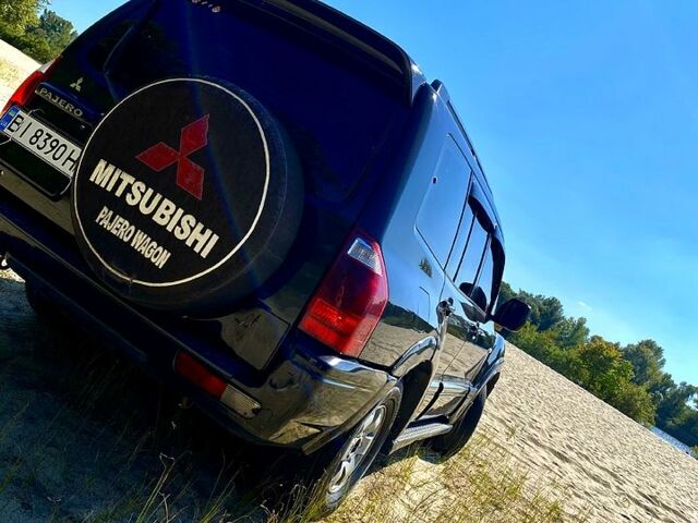 Черный Мицубиси Паджеро, объемом двигателя 3.5 л и пробегом 314 тыс. км за 7247 $, фото 2 на Automoto.ua