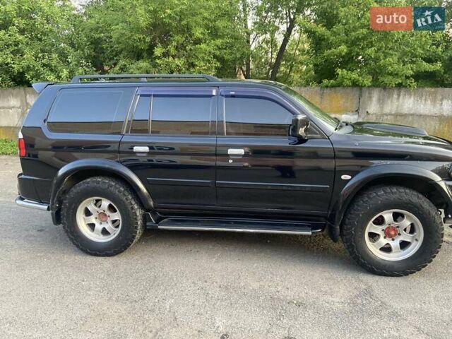 Чорний Міцубісі Паджеро, об'ємом двигуна 3 л та пробігом 276 тис. км за 8500 $, фото 22 на Automoto.ua