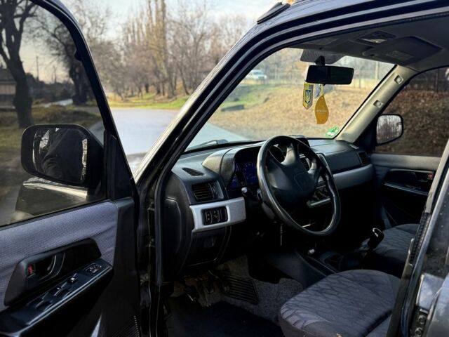 Черный Мицубиси Паджеро, объемом двигателя 2 л и пробегом 250 тыс. км за 3150 $, фото 10 на Automoto.ua