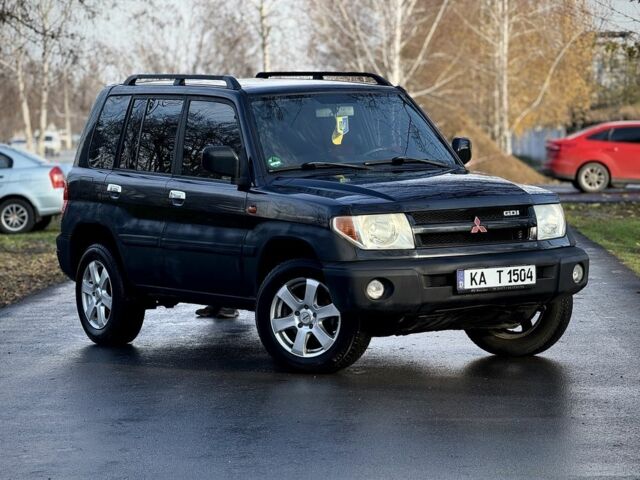Черный Мицубиси Паджеро, объемом двигателя 2 л и пробегом 250 тыс. км за 3150 $, фото 4 на Automoto.ua