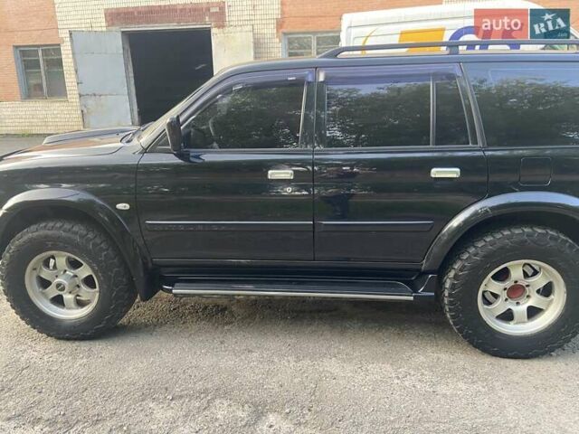 Чорний Міцубісі Паджеро, об'ємом двигуна 3 л та пробігом 276 тис. км за 8500 $, фото 25 на Automoto.ua