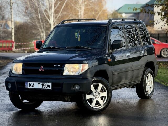 Черный Мицубиси Паджеро, объемом двигателя 2 л и пробегом 250 тыс. км за 3150 $, фото 3 на Automoto.ua