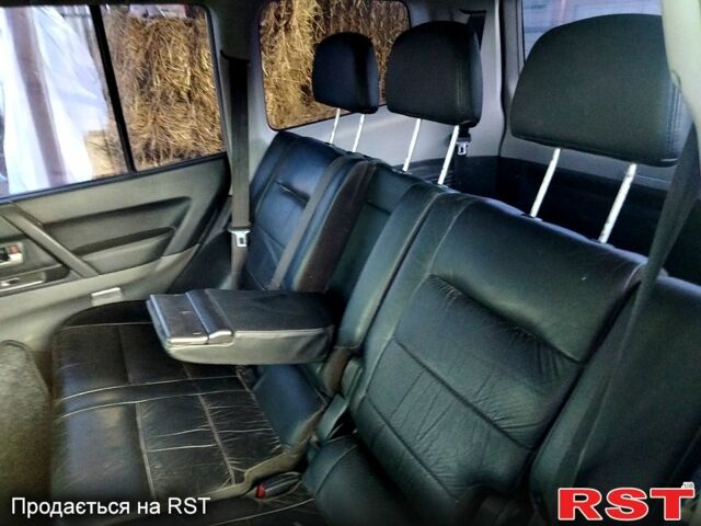 Чорний Міцубісі Паджеро, об'ємом двигуна 3 л та пробігом 244 тис. км за 7800 $, фото 1 на Automoto.ua