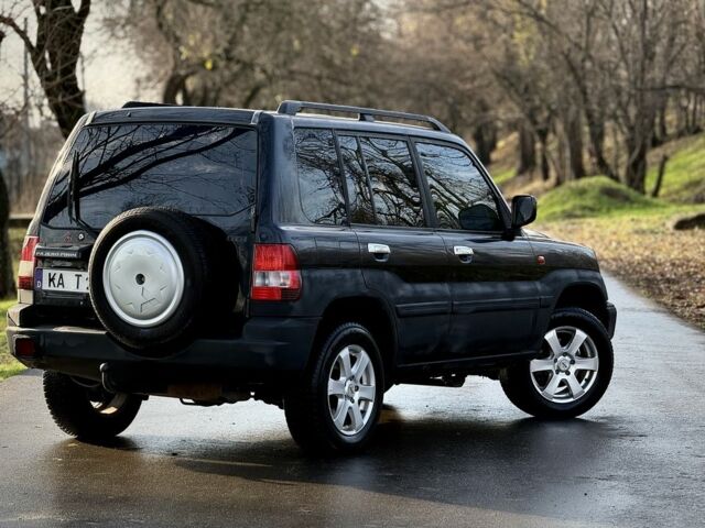 Черный Мицубиси Паджеро, объемом двигателя 2 л и пробегом 250 тыс. км за 3150 $, фото 5 на Automoto.ua