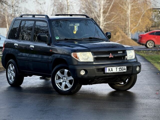 Черный Мицубиси Паджеро, объемом двигателя 2 л и пробегом 250 тыс. км за 3150 $, фото 2 на Automoto.ua