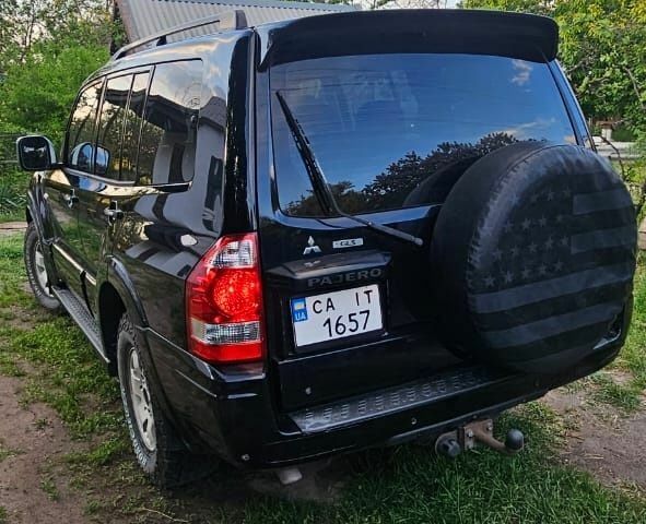 Чорний Міцубісі Паджеро, об'ємом двигуна 3 л та пробігом 315 тис. км за 7850 $, фото 4 на Automoto.ua