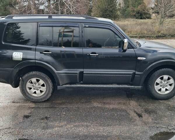 Чорний Міцубісі Паджеро, об'ємом двигуна 3.2 л та пробігом 203 тис. км за 7900 $, фото 2 на Automoto.ua