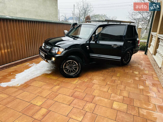 Черный Мицубиси Паджеро, объемом двигателя 3.2 л и пробегом 230 тыс. км за 10800 $, фото 134 на Automoto.ua