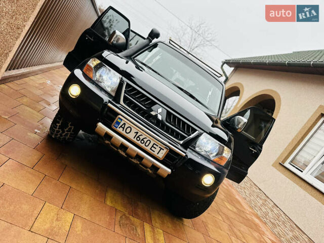 Черный Мицубиси Паджеро, объемом двигателя 3.2 л и пробегом 230 тыс. км за 10800 $, фото 135 на Automoto.ua