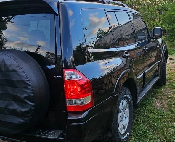 Чорний Міцубісі Паджеро, об'ємом двигуна 3 л та пробігом 315 тис. км за 7850 $, фото 5 на Automoto.ua