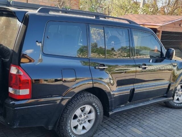 Чорний Міцубісі Паджеро, об'ємом двигуна 3 л та пробігом 315 тис. км за 7850 $, фото 10 на Automoto.ua