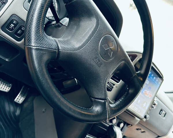 Черный Мицубиси Паджеро, объемом двигателя 3.2 л и пробегом 230 тыс. км за 10800 $, фото 124 на Automoto.ua