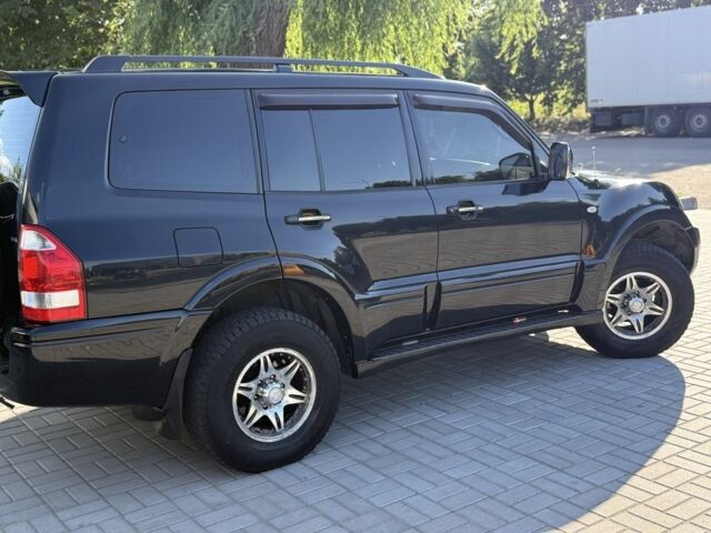 Чорний Міцубісі Паджеро, об'ємом двигуна 3 л та пробігом 265 тис. км за 8500 $, фото 2 на Automoto.ua