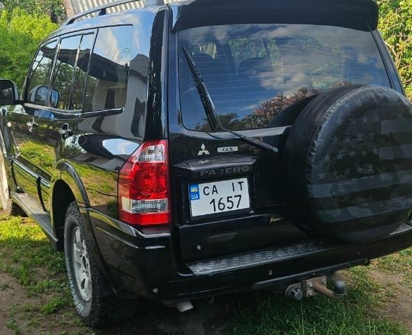 Чорний Міцубісі Паджеро, об'ємом двигуна 3 л та пробігом 315 тис. км за 7850 $, фото 2 на Automoto.ua