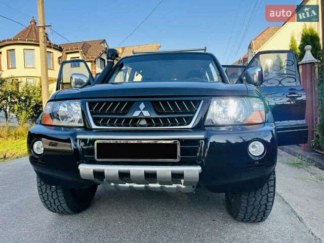 Черный Мицубиси Паджеро, объемом двигателя 3.2 л и пробегом 230 тыс. км за 10800 $, фото 77 на Automoto.ua