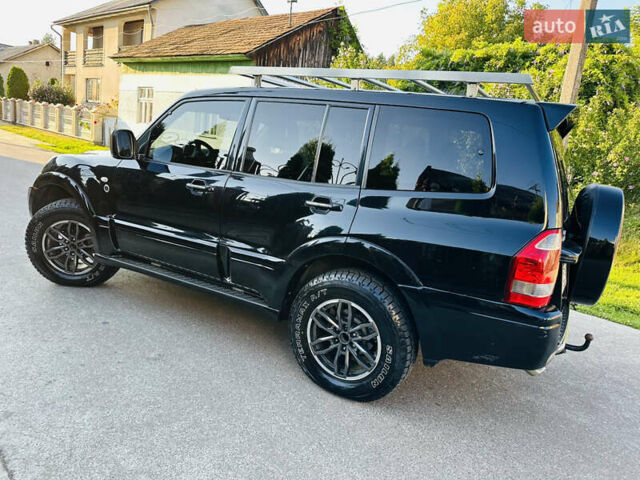 Черный Мицубиси Паджеро, объемом двигателя 3.2 л и пробегом 230 тыс. км за 10800 $, фото 102 на Automoto.ua