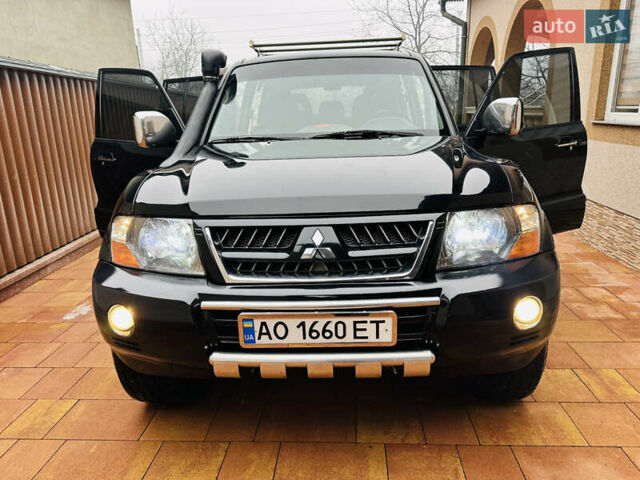 Черный Мицубиси Паджеро, объемом двигателя 3.2 л и пробегом 230 тыс. км за 10800 $, фото 153 на Automoto.ua