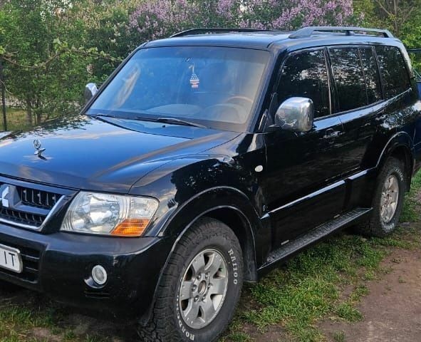 Чорний Міцубісі Паджеро, об'ємом двигуна 3 л та пробігом 315 тис. км за 7850 $, фото 1 на Automoto.ua