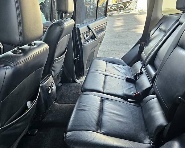 Чорний Міцубісі Паджеро, об'ємом двигуна 3 л та пробігом 210 тис. км за 11000 $, фото 4 на Automoto.ua