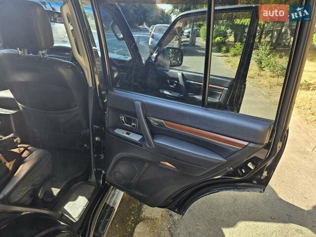 Чорний Міцубісі Паджеро, об'ємом двигуна 3 л та пробігом 210 тис. км за 11000 $, фото 13 на Automoto.ua
