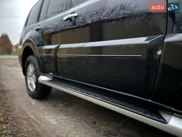 Чорний Міцубісі Паджеро, об'ємом двигуна 3 л та пробігом 169 тис. км за 14150 $, фото 3 на Automoto.ua